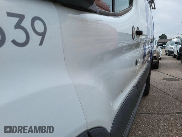 2015 Ford Transit Cargo z VIN 1FTNR1ZM8FKA55185, wystawiony jako IAAI lot #42515954 z przebiegiem 86 918 mil mil oraz . Historia ofert i sprzedaży dostępna na DreamBid. Obrazek 10.