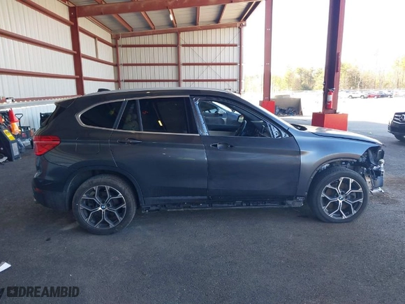 2021 BMW X1 xDrive28i with VIN WBXJG9C02M5T41170, listed as a IAAI auction lot 41886408 with 56,316 mi miles. Bid and sale history available at carsss.com. Image 14.