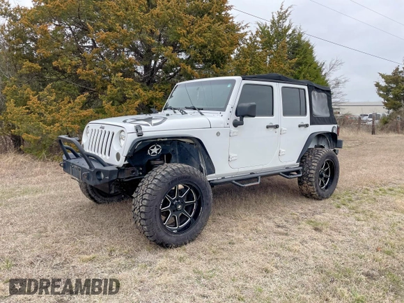 2016 Jeep Wrangler Unlimited Sport with VIN 1C4HJWDG7GL114807, listed as a Copart auction lot 54988515 with 118,651 mi miles and Clean Title. Bid and sale history available at DreamBid. Image 2.