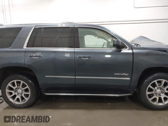 2019 GMC Yukon Denali with VIN 1GKS2CKJ9KR359070, listed as a IAAI auction lot 41682027 with 95,015 mi miles. Bid and sale history available at carsss.com. Image 13.