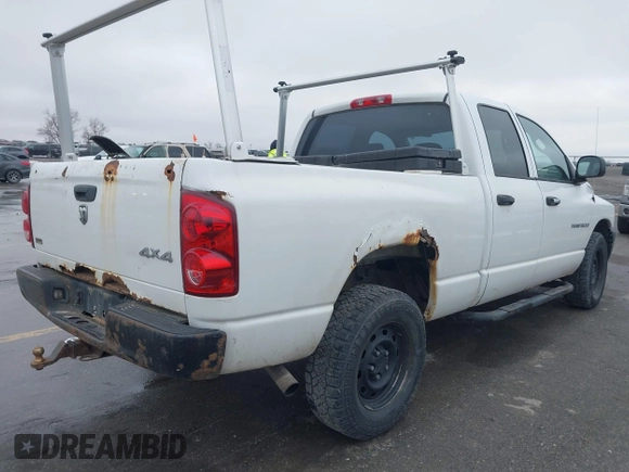 2007 Dodge 1500 ST with VIN 1D7HU18P57J590379, listed as a IAAI auction lot 41753511 with 208,080 mi miles and . Bid and sale history available at DreamBid. Image 4.