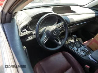 2023 Mazda CX-30 S Carbon Edition z VIN 3MVDMBCM2PM524384, wystawiony jako Copart lot #62699155 z przebiegiem 25 765 mil mil oraz Szkoda całkowita • Salvage title. Historia ofert i sprzedaży dostępna na DreamBid. Obrazek 8.