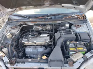 2003 Mitsubishi Lancer ES with VIN JA3AJ26E63U092730, listed as a IAAI auction lot 41506294 with 188,007 mi miles. Bid and sale history available at carsss.com. Image 10.