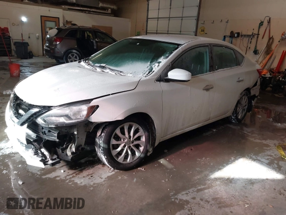 2019 Nissan Sentra S z VIN 3N1AB7AP9KY325065, wystawiony jako IAAI lot #41612204 z przebiegiem 141 818 mil mil oraz . Historia ofert i sprzedaży dostępna na DreamBid. Obrazek 17.