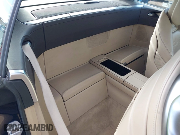 2013 Mercedes-Benz SL 63 AMG with VIN WDDJK7EA9DF021219, listed as a IAAI auction lot 41430597 with 98,817 mi miles and . Bid and sale history available at DreamBid. Image 8.