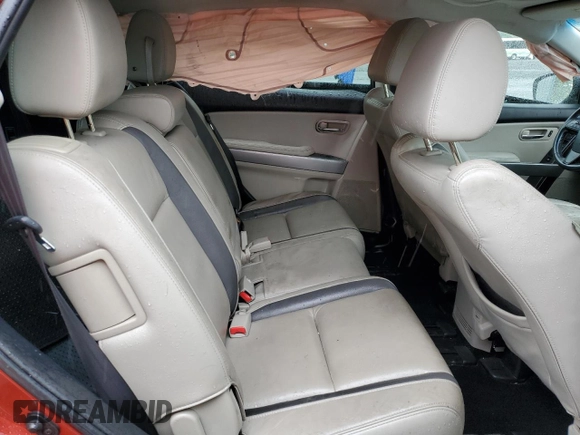 2012 Mazda CX-9 Grand Touring z VIN JM3TB2DV8C0340811, wystawiony jako Copart lot #56756905 z przebiegiem 102 972 mil mil oraz Szkoda całkowita • Salvage title. Historia ofert i sprzedaży dostępna na DreamBid. Obrazek 11.