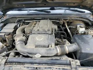 2005 Nissan Pathfinder LE z VIN 5N1AR18U95C706750, wystawiony jako Copart lot #81186314 z przebiegiem 259 815 mil mil oraz Szkoda całkowita • Salvage title. Historia ofert i sprzedaży dostępna na DreamBid. Obrazek 11.