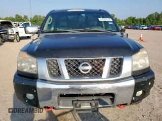 2008 Nissan Titan with VIN 1N6BA07F08N310449, listed as a Copart auction lot 58926115 with 323,607 mi miles and Salvage title. Bid and sale history available at DreamBid. Image 5.