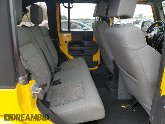 2009 Jeep Wrangler Unlimited Rubicon with VIN 1J8GA69109L761089, listed as a Copart auction lot 57975985 with 195,530 mi miles and Salvage title. Bid and sale history available at DreamBid. Image 11.