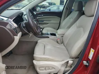 2014 Cadillac SRX Performance Collection z VIN 3GYFNCE32ES560497, wystawiony jako Copart lot #53107835 z przebiegiem 140 378 mil mil oraz Szkoda całkowita • Salvage title. Historia ofert i sprzedaży dostępna na DreamBid. Obrazek 7.