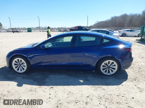 2021 Tesla Model 3 Long Range with VIN 5YJ3E1EB3MF031457, listed as a IAAI auction lot 41630758 with 71,113 mi miles and . Bid and sale history available at carsss.com. Image 14.