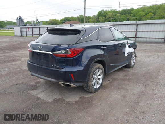 2016 Lexus RX 350 with VIN 2T2BZMCA1GC012079, listed as a IAAI auction lot 42265304 with 124,861 mi miles and . Bid and sale history available at DreamBid. Image 4.