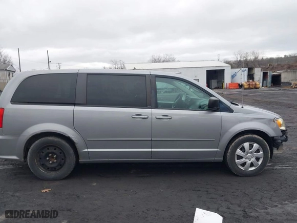 2014 Dodge Grand Caravan SE with VIN 2C4RDGBGXER106984, listed as a IAAI auction lot 41815414 with 170,984 mi miles. Bid and sale history available at carsss.com. Image 13.