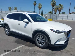 2019 Mazda CX-9 Touring with VIN JM3TCACY8K0300956, listed as a IAAI auction lot 42493003 with 123,709 mi miles and . Bid and sale history available at DreamBid. Image 1.