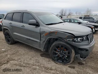 2021 Jeep Grand Cherokee Laredo X with VIN 1C4RJEAG8MC713939, listed as a Copart auction lot 45969305 with 73,231 mi miles and Salvage Title. Bid and sale history available at carsss.com. Image 4.