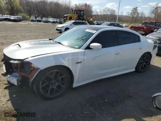 2019 Dodge Charger Scat Pack with VIN 2C3CDXGJ5KH558762, listed as a Copart auction lot 54245625 with 57,123 mi miles and Clean Title. Bid and sale history available at carsss.com. Image 1.