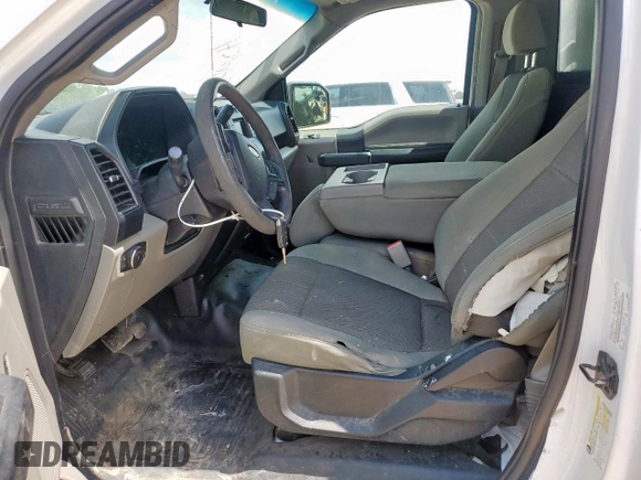2016 Ford F-150 XL with VIN 1FTNF1CG0GKD81110, listed as a Copart auction lot 57208315 with 211,574 mi miles and Salvage title. Bid and sale history available at DreamBid. Image 7.