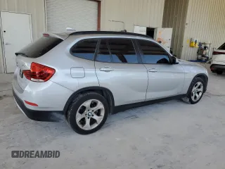 2014 BMW X1 sDrive28i z VIN WBAVM1C57EVW50653, wystawiony jako Copart lot #57309385 z przebiegiem Nie podano mil oraz Szkoda całkowita • Salvage title. Historia ofert i sprzedaży dostępna na DreamBid. Obrazek 3.