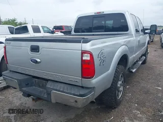 2015 Ford F-250 Lariat with VIN 1FT7W2B6XFEB03755, listed as a IAAI auction lot 42147048 with 100,239 mi miles and . Bid and sale history available at DreamBid. Image 4.