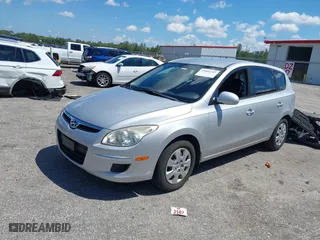 2011 Hyundai Elantra Touring GL with VIN KMHDB8AE9BU105082, listed as a IAAI auction lot 41889297 with 84,018 mi miles. Bid and sale history available at carsss.com. Image 17.