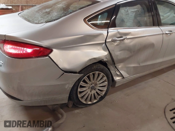 2015 Ford Fusion SE Hybrid with VIN 3FA6P0LU4FR151040, listed as a IAAI auction lot 41376155 with 120,486 mi miles. Bid and sale history available at carsss.com. Image 6.