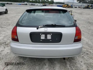 1998 Honda Civic DX z VIN 2HGEJ644XWH120512, wystawiony jako Copart lot #59639345 z przebiegiem 76 588 mil mil oraz Czysty tytuł • Clean title. Historia ofert i sprzedaży dostępna na DreamBid. Obrazek 6.