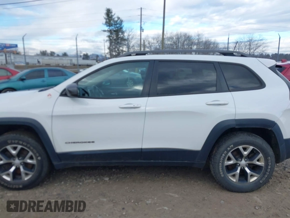2017 Jeep Cherokee Trailhawk z VIN 1C4PJMBS4HW647835, wystawiony jako IAAI lot #41375077 z przebiegiem 87 208 mil mil oraz . Historia ofert i sprzedaży dostępna na DreamBid. Obrazek 14.
