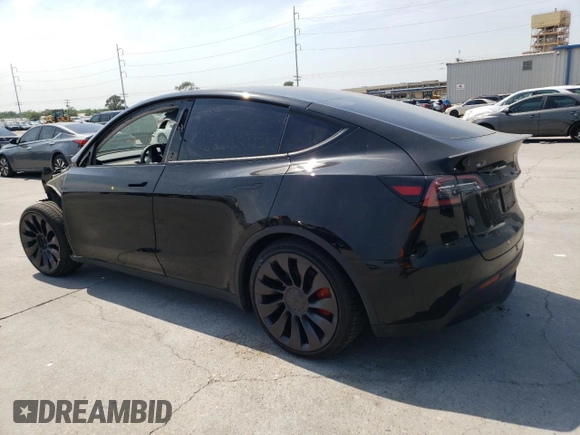 2023 Tesla Model Y Performance with VIN 7SAYGDEF9PF947667, listed as a Copart auction lot 52314795 with 40,634 mi miles and Salvage Title. Bid and sale history available at DreamBid. Image 2.