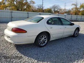 2000 Chrysler LHS z VIN 2C3HC56G4YH292405, wystawiony jako Copart lot #78263134 z przebiegiem 73 468 mil mil oraz Tytuł czysty. Historia ofert i sprzedaży dostępna na DreamBid. Obrazek 3.