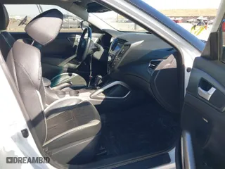 2014 Hyundai Veloster Turbo with VIN KMHTC6AE5EU201714, listed as a IAAI auction lot 40671069 with 151,901 mi miles. Bid and sale history available at carsss.com. Image 5.