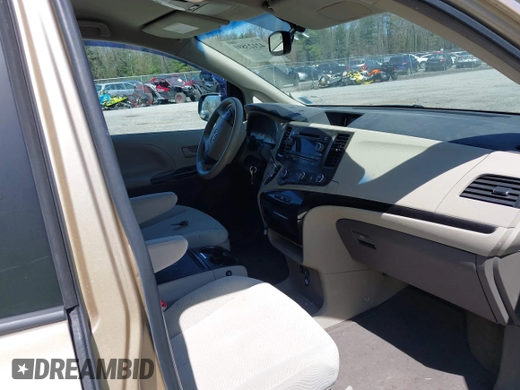 2012 Toyota Sienna LE AAS with VIN 5TDKK3DC9CS184090, listed as a IAAI auction lot 42123891 with 162,065 mi miles. Bid and sale history available at carsss.com. Image 5.