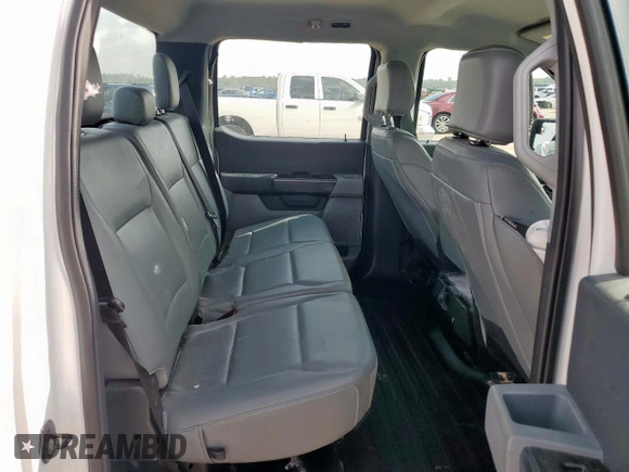2023 Ford F-150 XL с VIN 1FTEW1CB7PKF35512, выставлен на аукционе Copart как лот 63042965 с пробегом 72 721 миль миль и Списание • Salvage title. История ставок и продаж доступна на DreamBid. Изображение 10.
