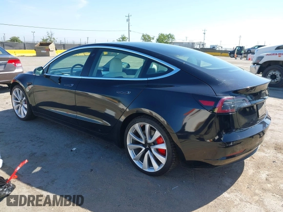 2019 Tesla Model 3 Long Range with VIN 5YJ3E1EB9KF231742, listed as a IAAI auction lot 42114608 with 86,657 mi miles and . Bid and sale history available at DreamBid. Image 3.