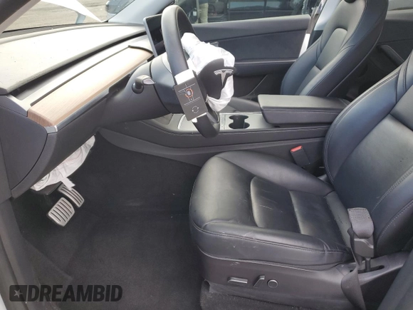 2022 Tesla Model Y Performance with VIN 7SAYGDEF2NF325084, listed as a Copart auction lot 44814525 with Not Provided miles and Salvage Title. Bid and sale history available at DreamBid. Image 7.