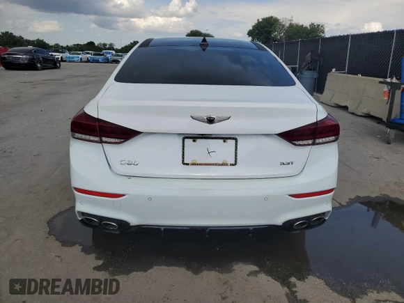 2018 Genesis G80 Sport z VIN KMHGN4JB7JU243284, wystawiony jako Copart lot #57919065 z przebiegiem 87 851 mil mil oraz Tytuł czysty. Historia ofert i sprzedaży dostępna na DreamBid. Obrazek 6.