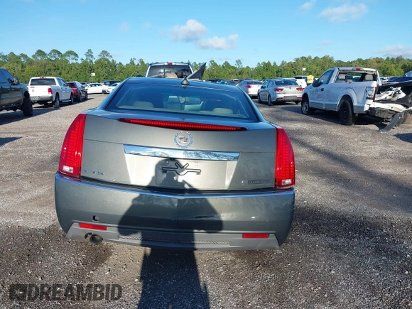 2011 Cadillac CTS Luxury with VIN 1G6DE5EY5B0154563, listed as a IAAI auction lot 36806985 with 92,635 mi miles and . Bid and sale history available at DreamBid. Image 16.