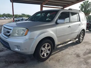 2009 Honda Pilot Touring z VIN 5FNYF38839B022943, wystawiony jako IAAI lot #42443006 z przebiegiem 199 184 mil mil oraz . Historia ofert i sprzedaży dostępna na DreamBid. Obrazek 2.