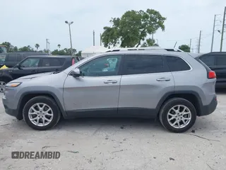 2018 Jeep Cherokee Latitude Plus with VIN 1C4PJLLB0JD534992, listed as a IAAI auction lot 42212429 with 125,928 mi miles and . Bid and sale history available at carsss.com. Image 14.
