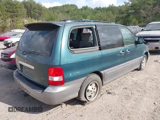 2005 Kia Sedona LX with VIN KNDUP132X56735119, listed as a IAAI auction lot 41798736 with 196,460 mi miles. Bid and sale history available at carsss.com. Image 4.