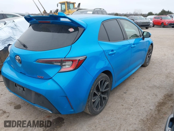 2019 Toyota Corolla Hatchback SE with VIN JTNK4RBEXK3033062, listed as a IAAI auction lot 41471618 with 195,001 mi miles. Bid and sale history available at carsss.com. Image 4.