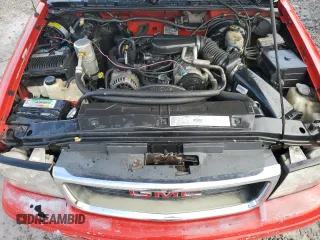 2000 GMC Sonoma SLS z VIN 1GTCS19W1Y8146005, wystawiony jako Copart lot #44068505 z przebiegiem 283 782 mil mil oraz Szkody całkowita. Historia ofert i sprzedaży dostępna na DreamBid. Obrazek 11.