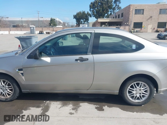 2008 Ford Focus SE with VIN 1FAHP33NX8W135881, listed as a IAAI auction lot 41668949 with 160,261 mi miles. Bid and sale history available at carsss.com. Image 15.