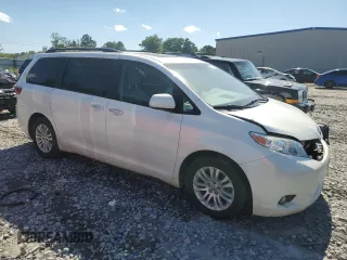 2015 Toyota Sienna XLE with VIN 5TDYK3DC3FS624612, listed as a Copart auction lot 57309295 with 188,467 mi miles and Salvage title. Bid and sale history available at DreamBid. Image 4.