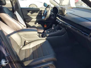 2025 Honda CR-V Sport Touring with VIN 2HKRS6H90SH809835, listed as a IAAI auction lot 42060201 with 9,358 mi miles and . Bid and sale history available at DreamBid. Image 5.