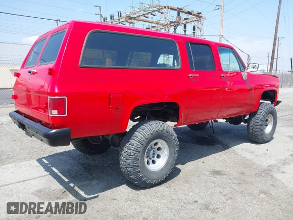1991 GMC Suburban z VIN 1GKGR26N7MF513031, wystawiony jako IAAI lot #42179575 z przebiegiem 68 871 mil mil oraz . Historia ofert i sprzedaży dostępna na DreamBid. Obrazek 4.