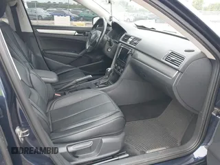 2014 Volkswagen Passat Wolfsburg Edition with VIN 1VWAT7A35EC044446, listed as a IAAI auction lot 42558007 with 165,285 mi miles and . Bid and sale history available at DreamBid. Image 5.