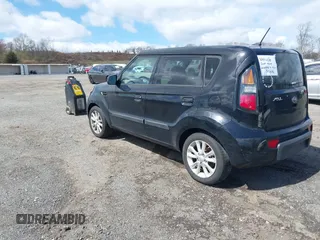 2010 Kia Soul + with VIN KNDJT2A29A7038620, listed as a IAAI auction lot 41989573 with 141,312 mi miles. Bid and sale history available at carsss.com. Image 3.