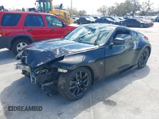 2017 Nissan 370Z with VIN JN1AZ4EH5HM954458, listed as a IAAI auction lot 41629907 with 113,606 mi miles. Bid and sale history available at carsss.com. Image 2.