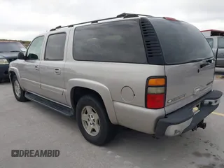 2004 Chevrolet Suburban LT with VIN 1GNEC16Z94J240907, listed as a IAAI auction lot 41331786 with 148,246 mi miles. Bid and sale history available at carsss.com. Image 3.