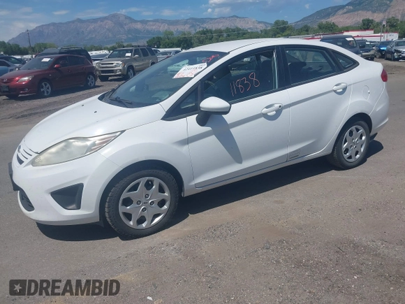 2013 Ford Fiesta S z VIN 3FADP4AJ6DM114105, wystawiony jako IAAI lot #42411838 z przebiegiem 497 236 mil mil oraz . Historia ofert i sprzedaży dostępna na DreamBid. Obrazek 2.